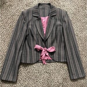 Women’s jacket with pink ribbon details